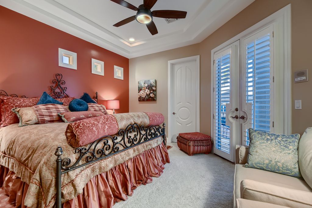 1278 Imperia Drive, Henderson, Nevada is a custom home in the exclusive guard gated community of Rapallo in Seven Hills, wrapped in lush green sculptured landscape in front and back.