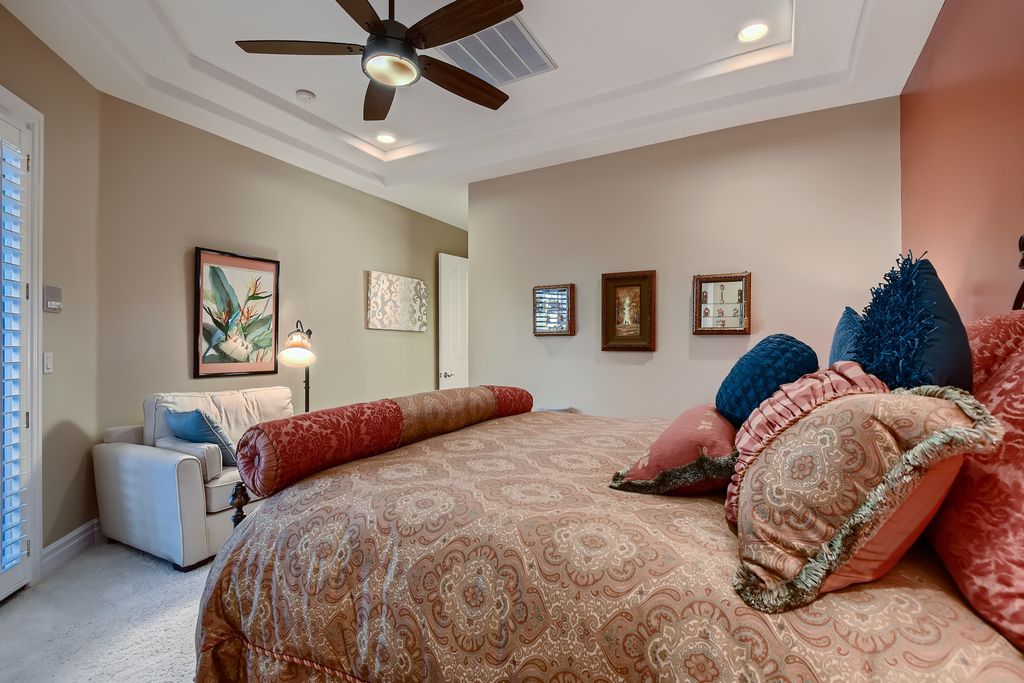 1278 Imperia Drive, Henderson, Nevada is a custom home in the exclusive guard gated community of Rapallo in Seven Hills, wrapped in lush green sculptured landscape in front and back.
