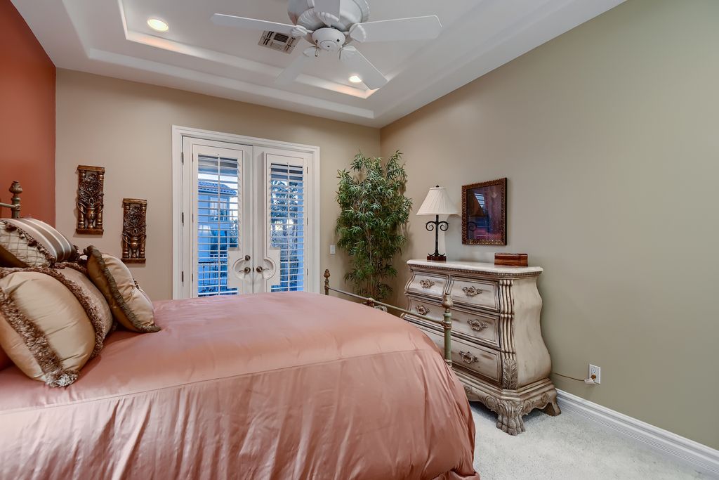 1278 Imperia Drive, Henderson, Nevada is a custom home in the exclusive guard gated community of Rapallo in Seven Hills, wrapped in lush green sculptured landscape in front and back.