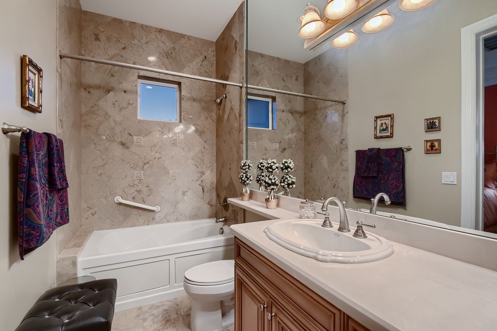 1278 Imperia Drive, Henderson, Nevada is a custom home in the exclusive guard gated community of Rapallo in Seven Hills, wrapped in lush green sculptured landscape in front and back.