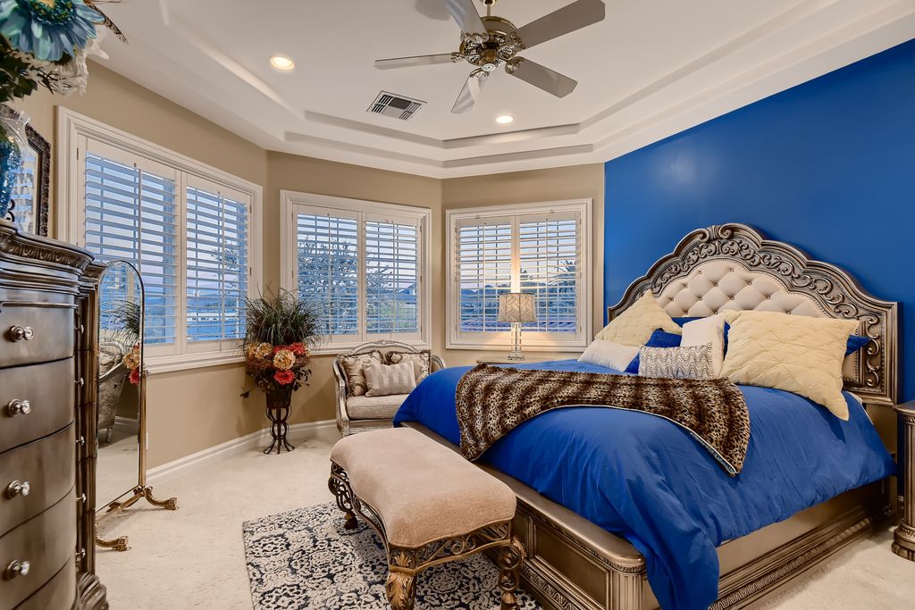 1278 Imperia Drive, Henderson, Nevada is a custom home in the exclusive guard gated community of Rapallo in Seven Hills, wrapped in lush green sculptured landscape in front and back.