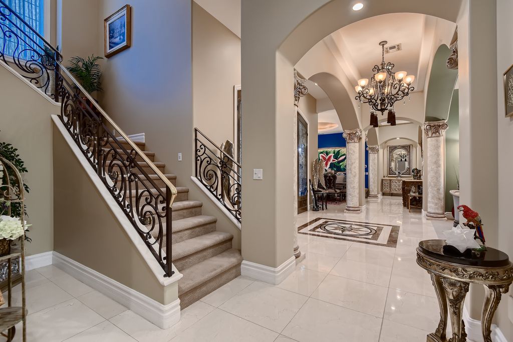1278 Imperia Drive, Henderson, Nevada is a custom home in the exclusive guard gated community of Rapallo in Seven Hills, wrapped in lush green sculptured landscape in front and back.