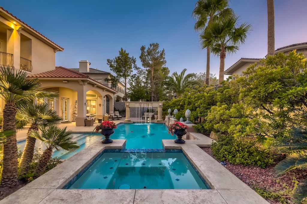 1278 Imperia Drive, Henderson, Nevada is a custom home in the exclusive guard gated community of Rapallo in Seven Hills, wrapped in lush green sculptured landscape in front and back.