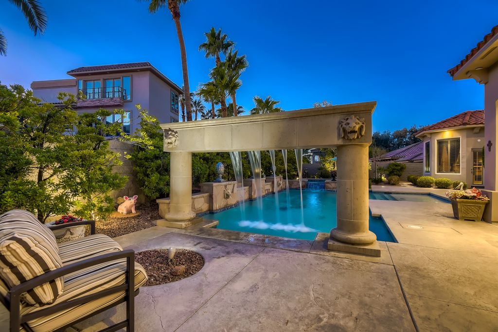 1278 Imperia Drive, Henderson, Nevada is a custom home in the exclusive guard gated community of Rapallo in Seven Hills, wrapped in lush green sculptured landscape in front and back.