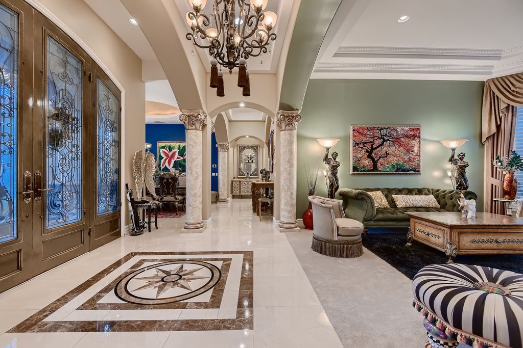 1278 Imperia Drive, Henderson, Nevada is a custom home in the exclusive guard gated community of Rapallo in Seven Hills, wrapped in lush green sculptured landscape in front and back.