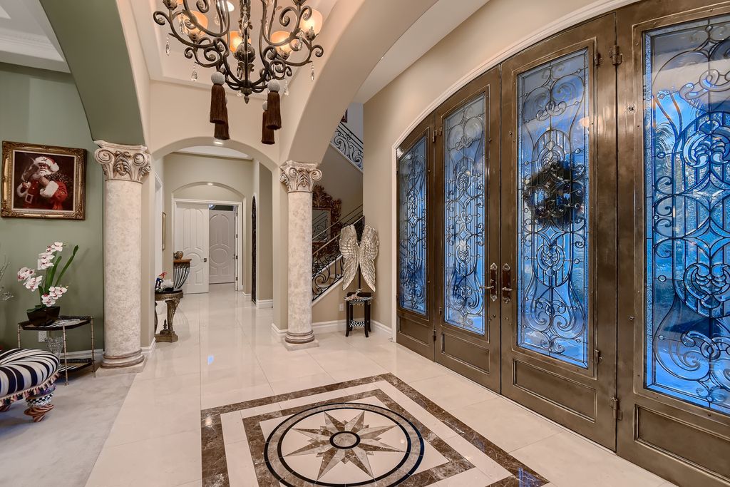 1278 Imperia Drive, Henderson, Nevada is a custom home in the exclusive guard gated community of Rapallo in Seven Hills, wrapped in lush green sculptured landscape in front and back.