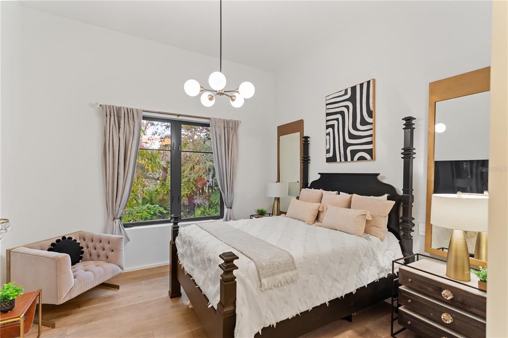 3940 Elysian Woods Lane, Sarasota, Florida is a mature landscaped estate is nestled on 1.47 acres and completely private in a small, gated community with only eight homes, was built with meticulous craftsmanship and bespoke finishes throughout.