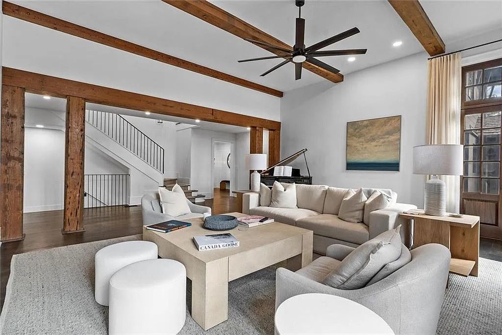 The House in Atlanta offers the lush green resort-style outdoor living with the saltwater heated pool and spa, dramatic lounge-side fireplace, and more now available for sale. This home located at 172 Blackland Dr NW, Atlanta, Georgia