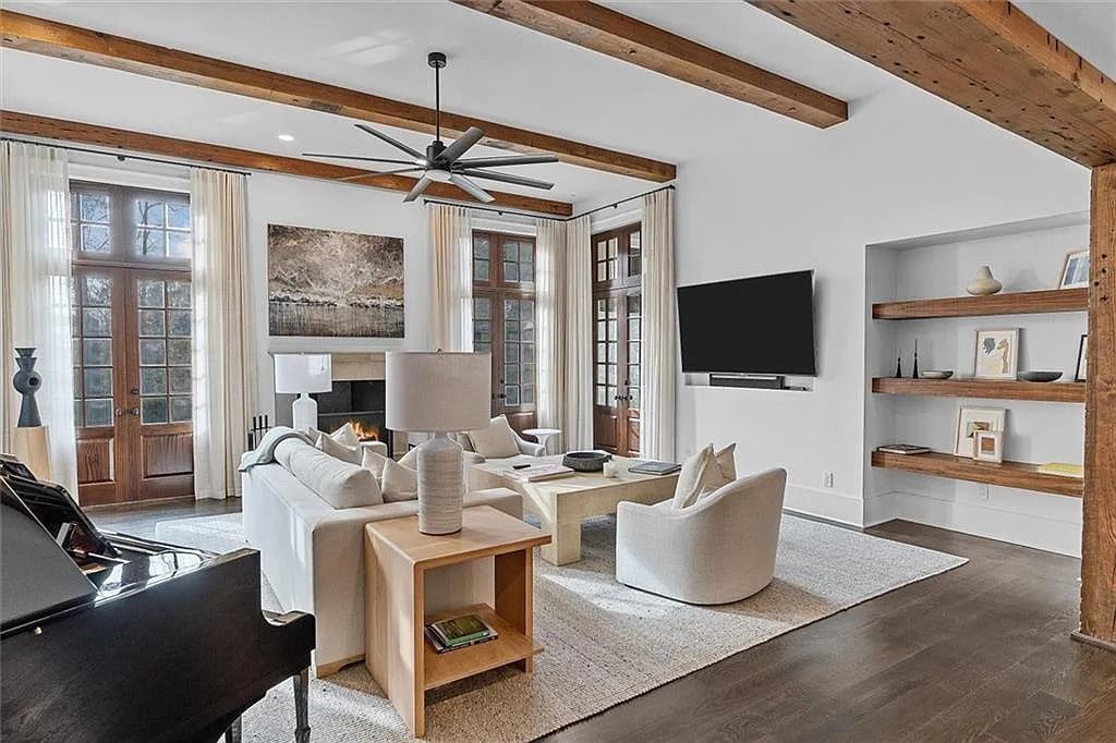 The House in Atlanta offers the lush green resort-style outdoor living with the saltwater heated pool and spa, dramatic lounge-side fireplace, and more now available for sale. This home located at 172 Blackland Dr NW, Atlanta, Georgia