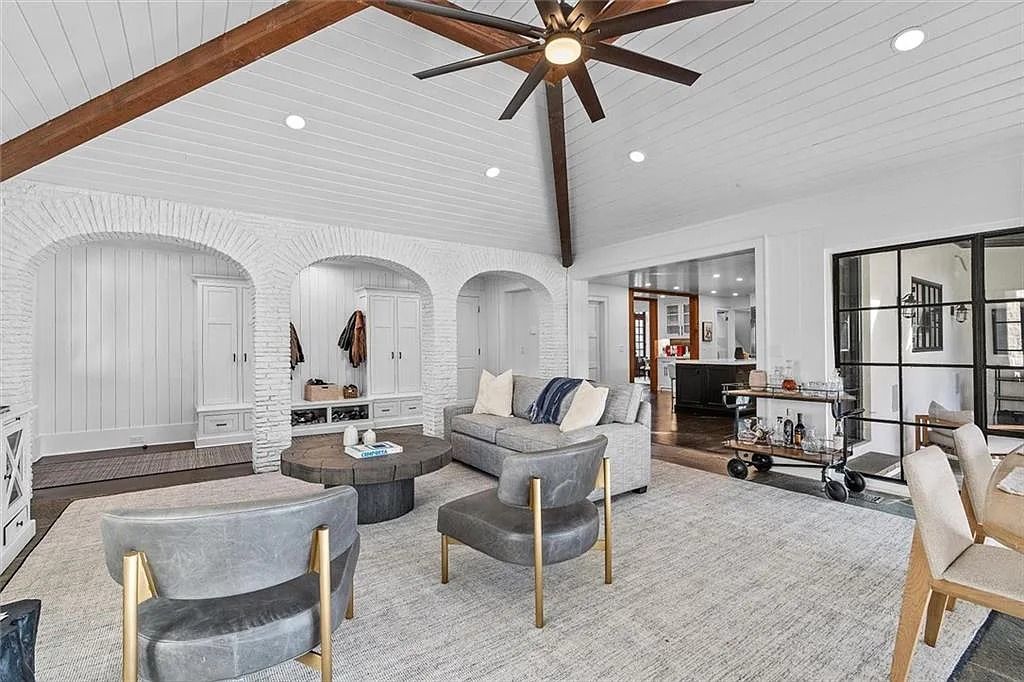The House in Atlanta offers the lush green resort-style outdoor living with the saltwater heated pool and spa, dramatic lounge-side fireplace, and more now available for sale. This home located at 172 Blackland Dr NW, Atlanta, Georgia