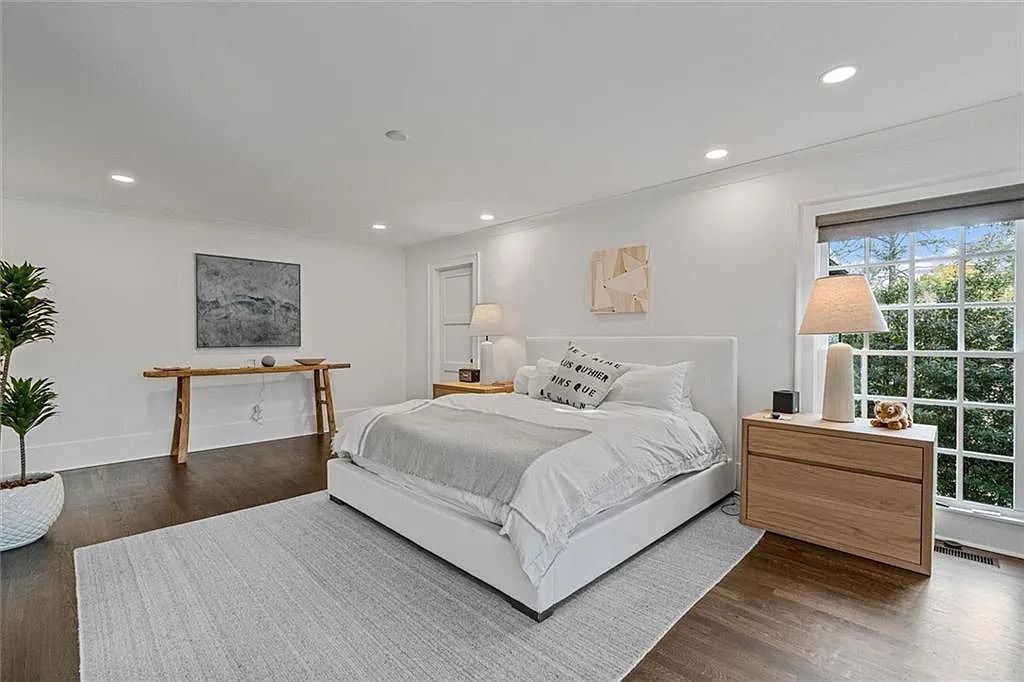 The House in Atlanta offers the lush green resort-style outdoor living with the saltwater heated pool and spa, dramatic lounge-side fireplace, and more now available for sale. This home located at 172 Blackland Dr NW, Atlanta, Georgia