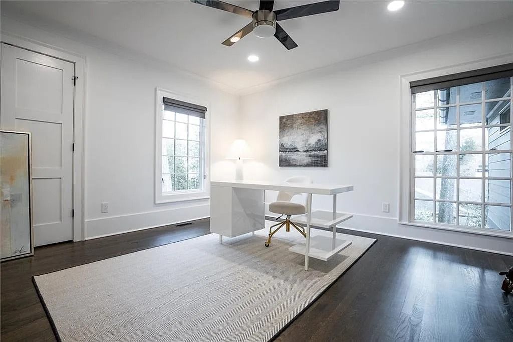 The House in Atlanta offers the lush green resort-style outdoor living with the saltwater heated pool and spa, dramatic lounge-side fireplace, and more now available for sale. This home located at 172 Blackland Dr NW, Atlanta, Georgia