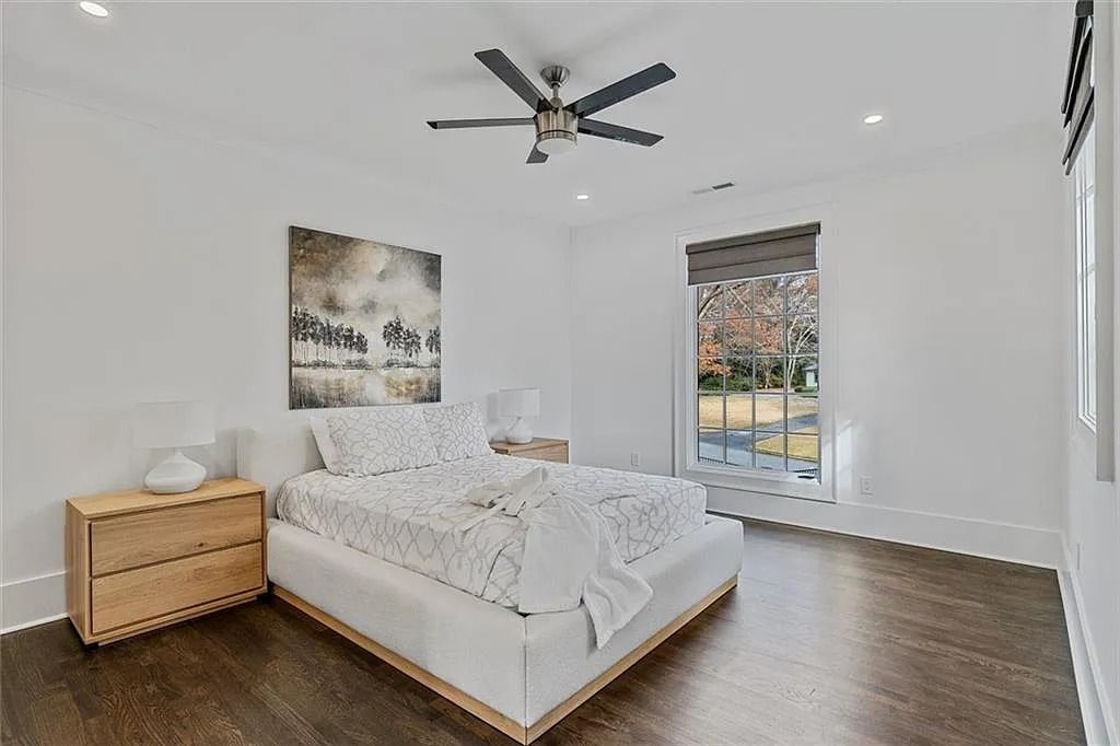 The House in Atlanta offers the lush green resort-style outdoor living with the saltwater heated pool and spa, dramatic lounge-side fireplace, and more now available for sale. This home located at 172 Blackland Dr NW, Atlanta, Georgia