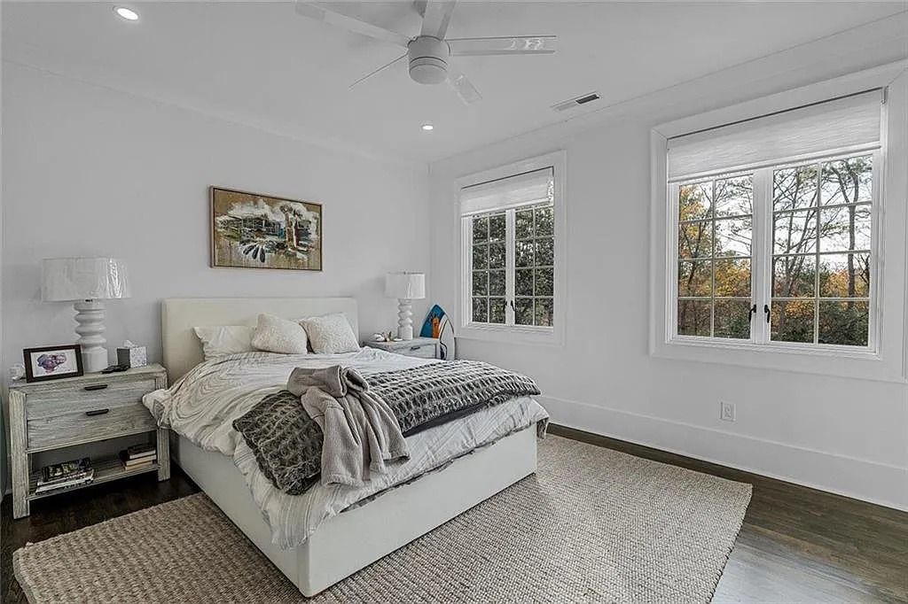 The House in Atlanta offers the lush green resort-style outdoor living with the saltwater heated pool and spa, dramatic lounge-side fireplace, and more now available for sale. This home located at 172 Blackland Dr NW, Atlanta, Georgia