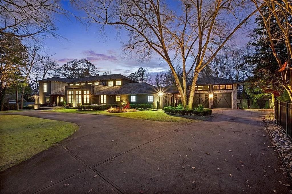 The House in Atlanta offers the lush green resort-style outdoor living with the saltwater heated pool and spa, dramatic lounge-side fireplace, and more now available for sale. This home located at 172 Blackland Dr NW, Atlanta, Georgia