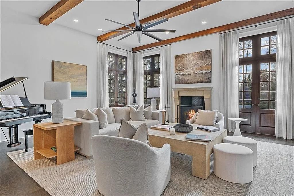 The House in Atlanta offers the lush green resort-style outdoor living with the saltwater heated pool and spa, dramatic lounge-side fireplace, and more now available for sale. This home located at 172 Blackland Dr NW, Atlanta, Georgia
