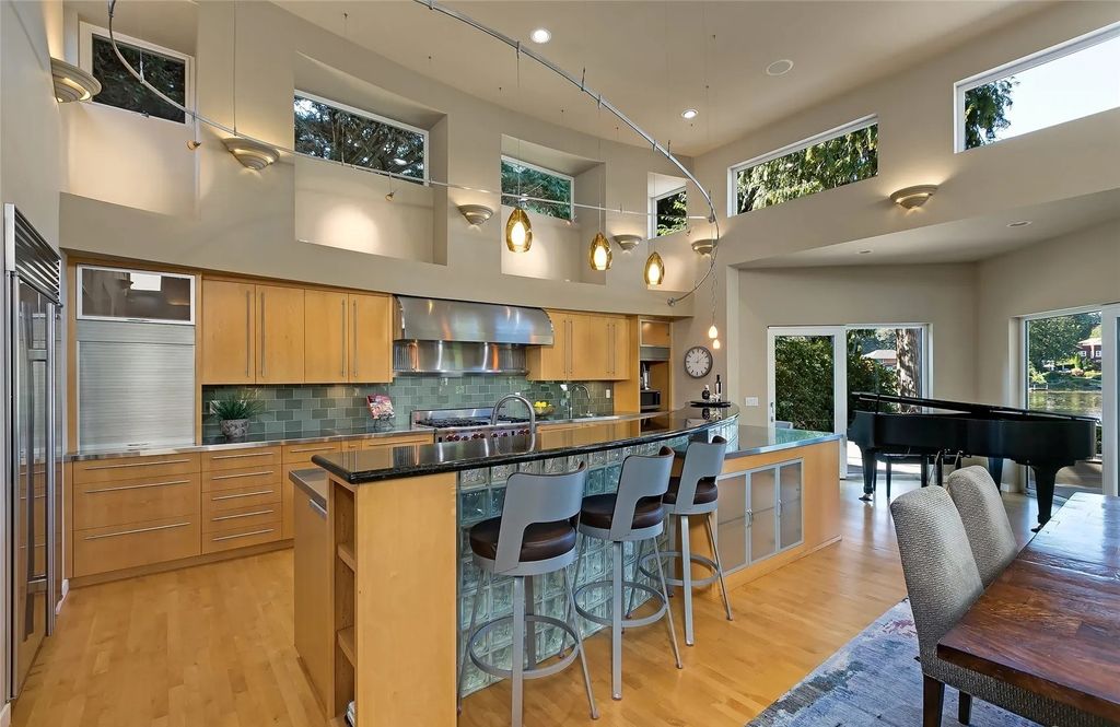 The House in Sammamish is a luxurious home with grand open concept living spaces, now available for sale. This home located at 2821 226th Avenue SE, Sammamish, Washington