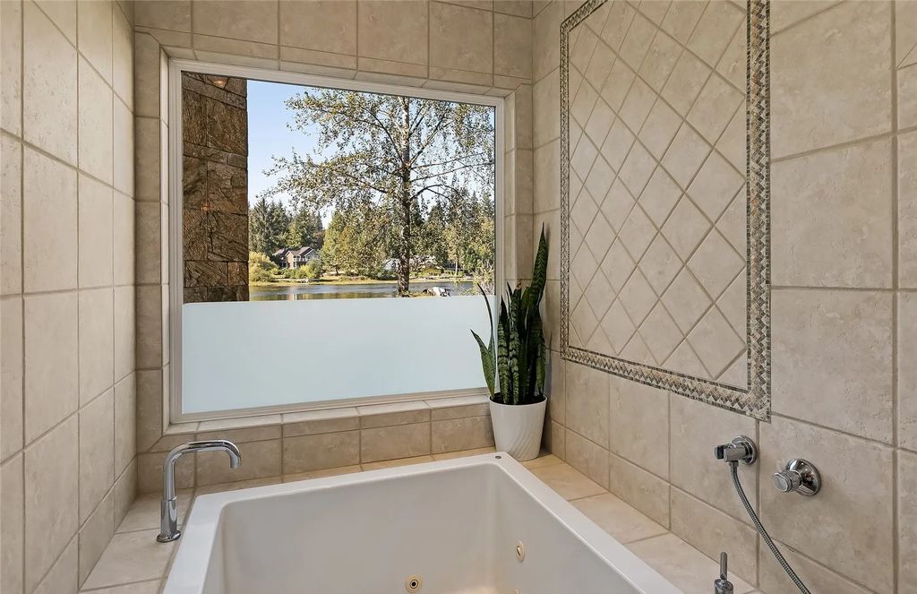The House in Sammamish is a luxurious home with grand open concept living spaces, now available for sale. This home located at 2821 226th Avenue SE, Sammamish, Washington