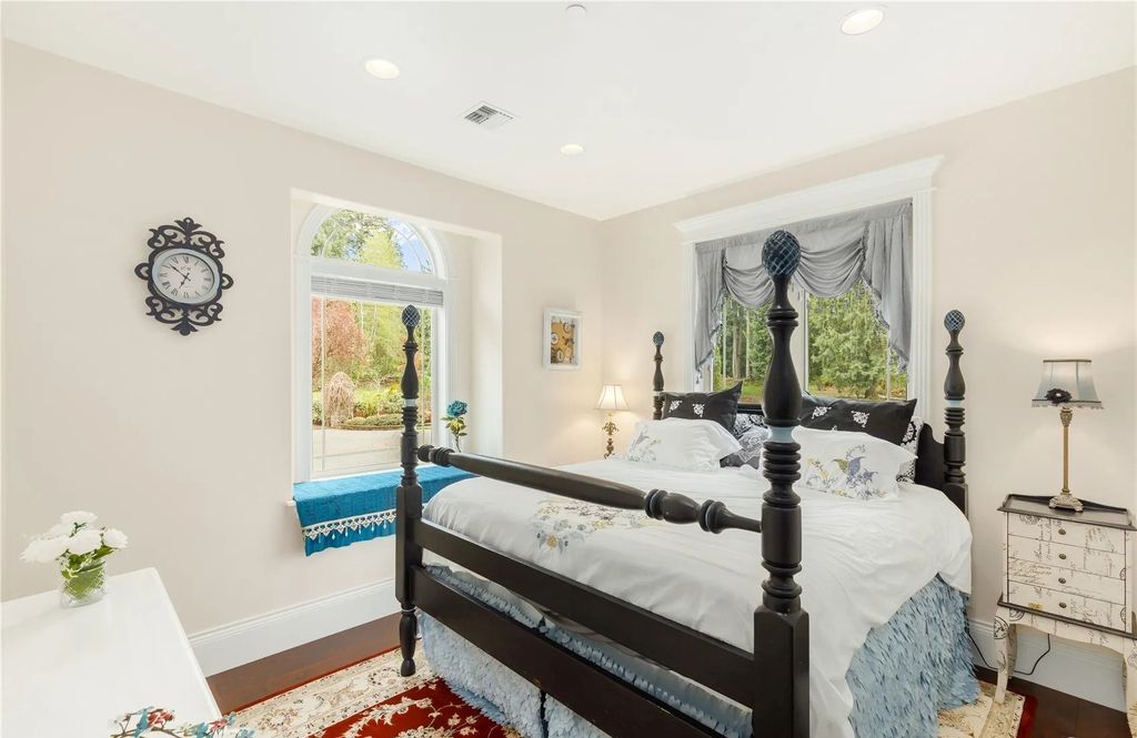 The Estate in Maple Valley boasts striking 22’ ceilings, library, home theater, gym, conference room, and an elevator to all three floors, now available for sale. This home located at 21145 212th Avenue SE, Maple Valley, Washington