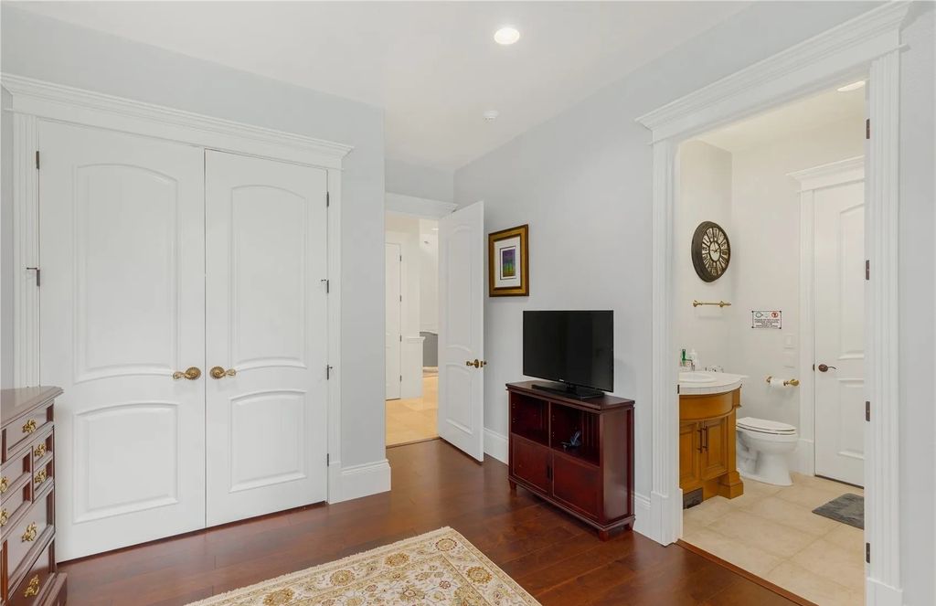 The Estate in Maple Valley boasts striking 22’ ceilings, library, home theater, gym, conference room, and an elevator to all three floors, now available for sale. This home located at 21145 212th Avenue SE, Maple Valley, Washington