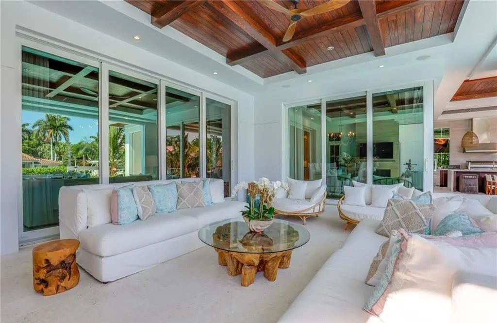 450 14th Ave South, Naples, Florida is a showcase of timeless sophistication with an Olde Florida twist and designer touches throughout near with superb dining and shopping options and a stone’s throw from the powder-soft sandy beach and tranquil Gulf waters.