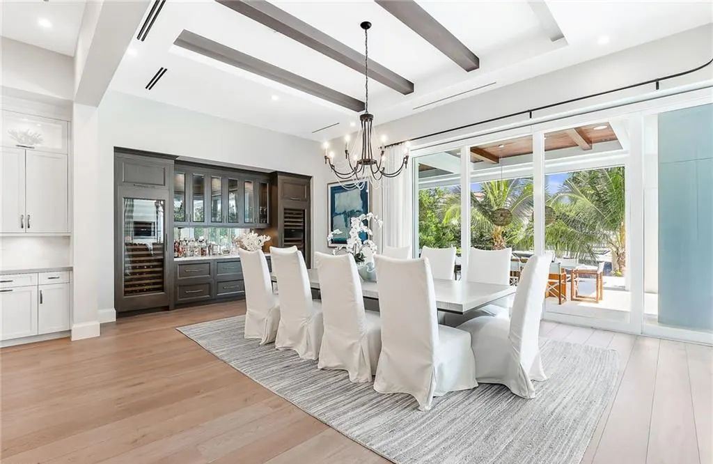 450 14th Ave South, Naples, Florida is a showcase of timeless sophistication with an Olde Florida twist and designer touches throughout near with superb dining and shopping options and a stone’s throw from the powder-soft sandy beach and tranquil Gulf waters.