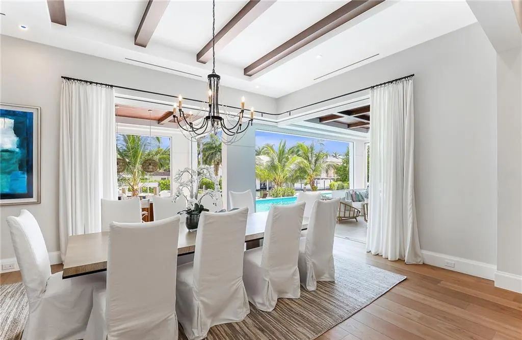 450 14th Ave South, Naples, Florida is a showcase of timeless sophistication with an Olde Florida twist and designer touches throughout near with superb dining and shopping options and a stone’s throw from the powder-soft sandy beach and tranquil Gulf waters.