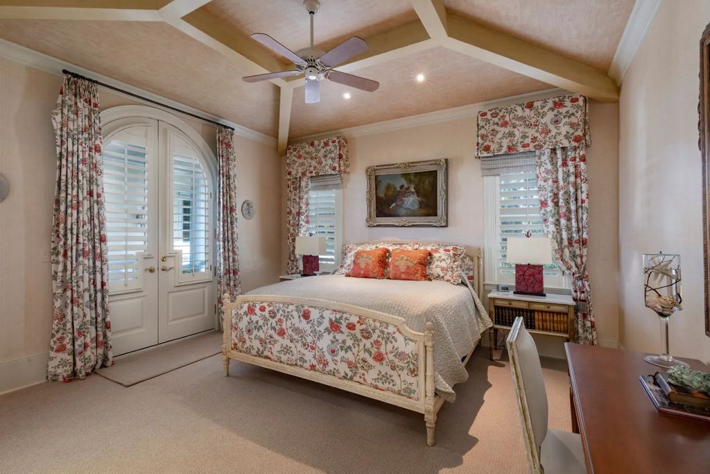 16440 Gulf Shores Drive, Boca Grande, Florida is a breathtaking home sit on unparalleled location offering privacy and luxurious coastal living with lush tropical landscaping and inviting outdoor spaces, boasting incredible views of the Gulf on one side and Lake Gasparilla on the other.