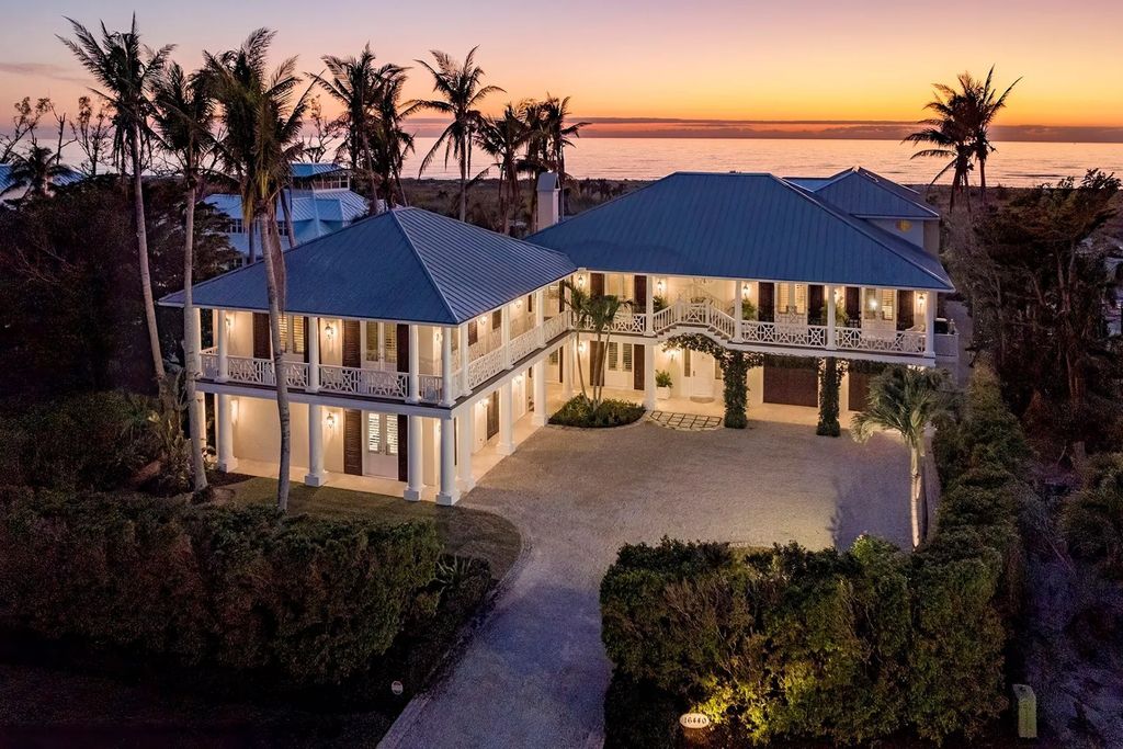 16440 Gulf Shores Drive, Boca Grande, Florida is a breathtaking home sit on unparalleled location offering privacy and luxurious coastal living with lush tropical landscaping and inviting outdoor spaces, boasting incredible views of the Gulf on one side and Lake Gasparilla on the other.