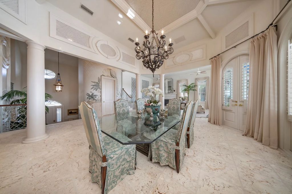 16440 Gulf Shores Drive, Boca Grande, Florida is a breathtaking home sit on unparalleled location offering privacy and luxurious coastal living with lush tropical landscaping and inviting outdoor spaces, boasting incredible views of the Gulf on one side and Lake Gasparilla on the other.