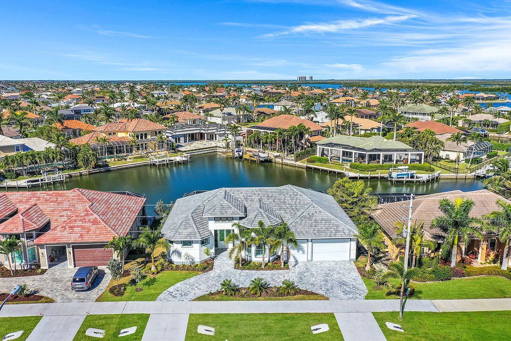 1964 San Marco Road, Marco Island, Florida is a stunning brand-new custom-built luxury coastal-contemporary residence tastefully decorated with high quality furnishings, ultra-custom features with high-end finishes and upgrades.