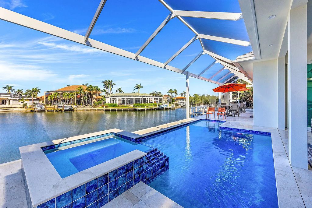 1964 San Marco Road, Marco Island, Florida is a stunning brand-new custom-built luxury coastal-contemporary residence tastefully decorated with high quality furnishings, ultra-custom features with high-end finishes and upgrades.