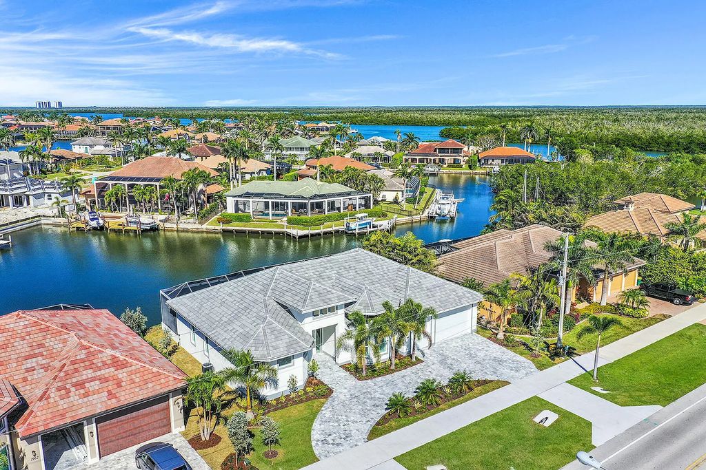 1964 San Marco Road, Marco Island, Florida is a stunning brand-new custom-built luxury coastal-contemporary residence tastefully decorated with high quality furnishings, ultra-custom features with high-end finishes and upgrades.