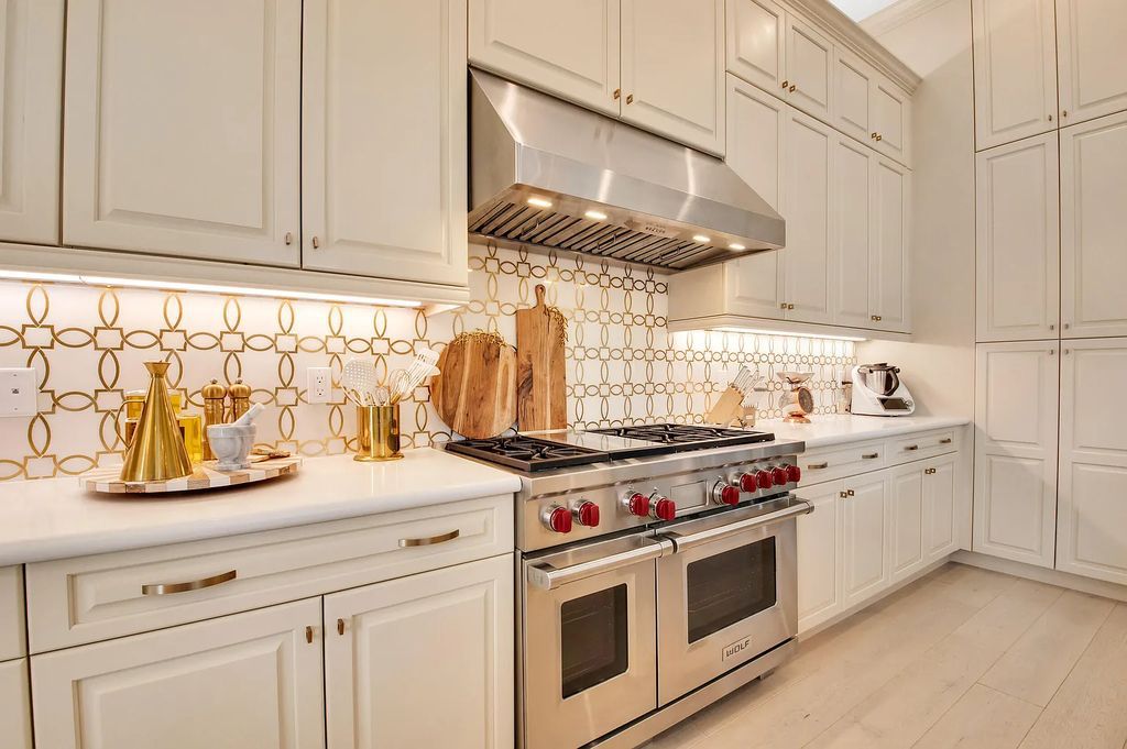 9016 Chauvet Way, Boca Raton, Florida, is built in the highly desired community of Boca Bridges and has more than 5000 square feet. This home is beautifully appointed with custom window treatments, stunning chandeliers, high-end furnishings and glamorous decor throughout.