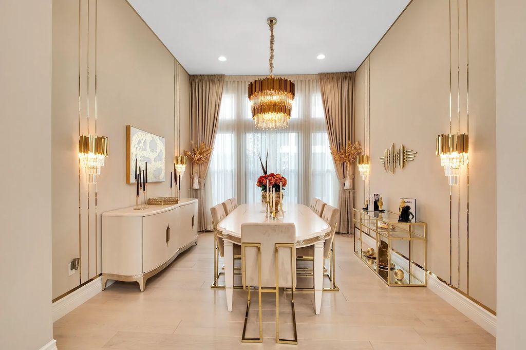9016 Chauvet Way, Boca Raton, Florida, is built in the highly desired community of Boca Bridges and has more than 5000 square feet. This home is beautifully appointed with custom window treatments, stunning chandeliers, high-end furnishings and glamorous decor throughout.