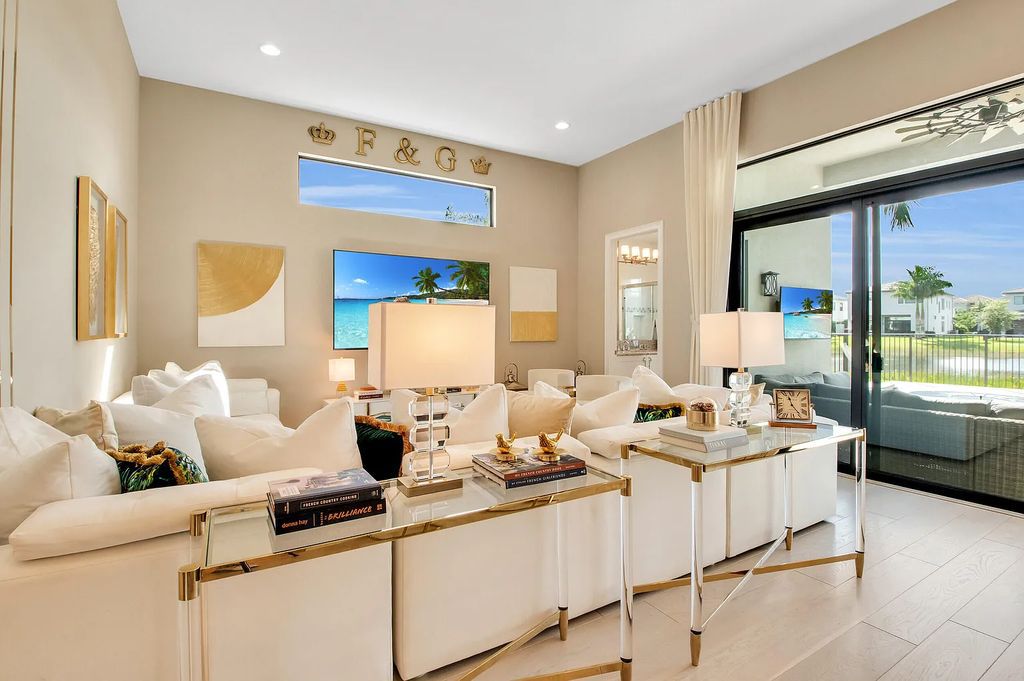 9016 Chauvet Way, Boca Raton, Florida, is built in the highly desired community of Boca Bridges and has more than 5000 square feet. This home is beautifully appointed with custom window treatments, stunning chandeliers, high-end furnishings and glamorous decor throughout.