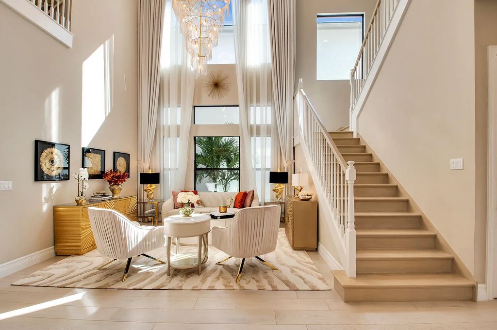 9016 Chauvet Way, Boca Raton, Florida, is built in the highly desired community of Boca Bridges and has more than 5000 square feet. This home is beautifully appointed with custom window treatments, stunning chandeliers, high-end furnishings and glamorous decor throughout.