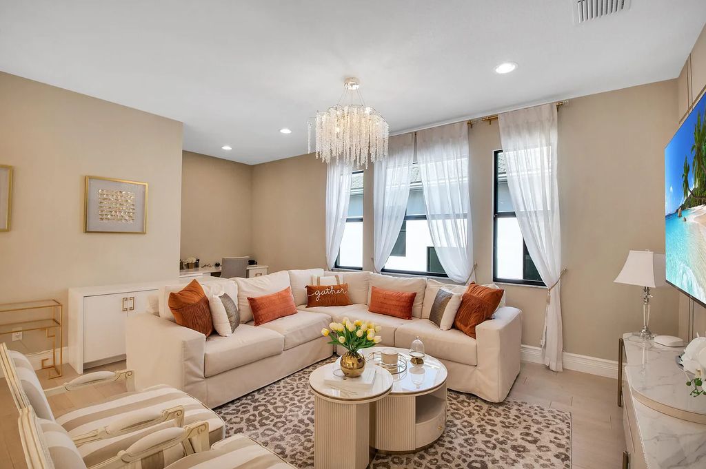 9016 Chauvet Way, Boca Raton, Florida, is built in the highly desired community of Boca Bridges and has more than 5000 square feet. This home is beautifully appointed with custom window treatments, stunning chandeliers, high-end furnishings and glamorous decor throughout.
