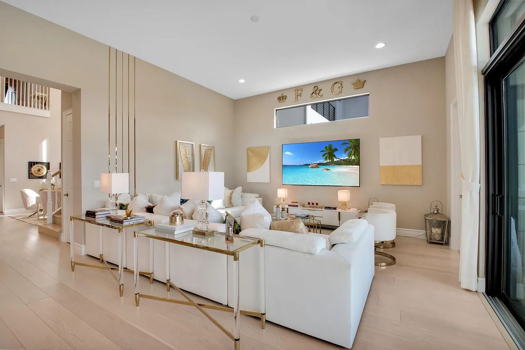 9016 Chauvet Way, Boca Raton, Florida, is built in the highly desired community of Boca Bridges and has more than 5000 square feet. This home is beautifully appointed with custom window treatments, stunning chandeliers, high-end furnishings and glamorous decor throughout.