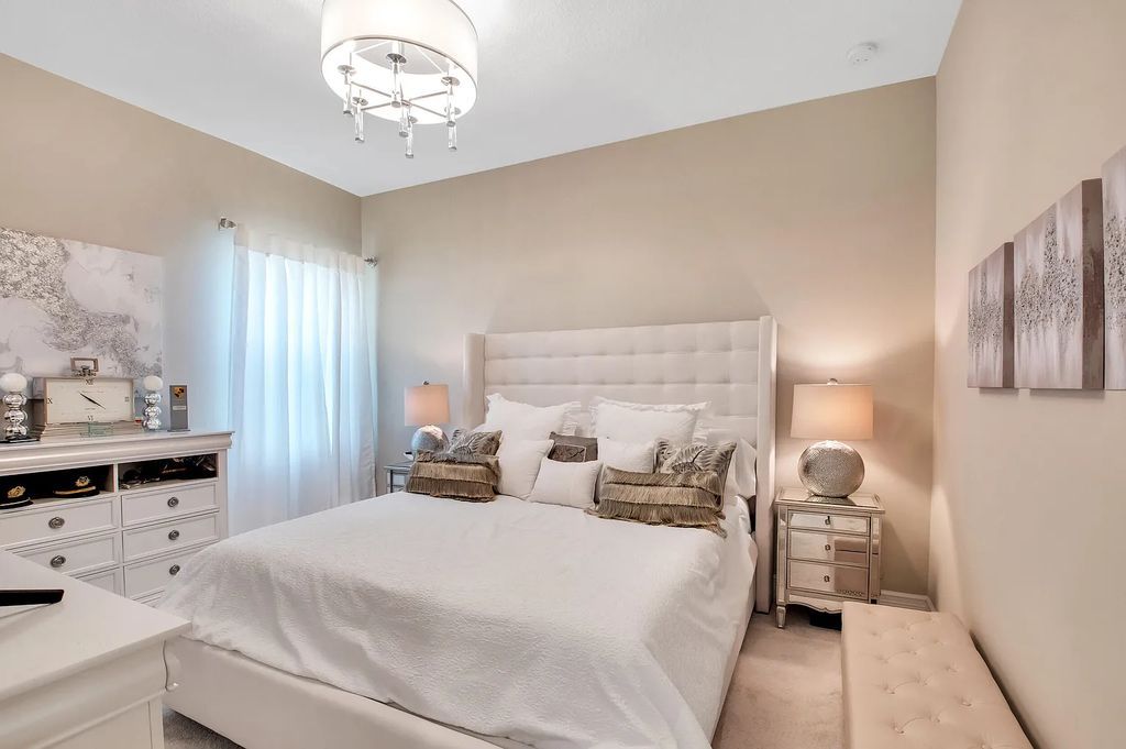 9016 Chauvet Way, Boca Raton, Florida, is built in the highly desired community of Boca Bridges and has more than 5000 square feet. This home is beautifully appointed with custom window treatments, stunning chandeliers, high-end furnishings and glamorous decor throughout.