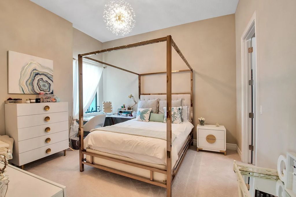 9016 Chauvet Way, Boca Raton, Florida, is built in the highly desired community of Boca Bridges and has more than 5000 square feet. This home is beautifully appointed with custom window treatments, stunning chandeliers, high-end furnishings and glamorous decor throughout.