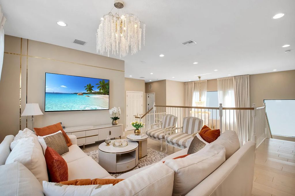9016 Chauvet Way, Boca Raton, Florida, is built in the highly desired community of Boca Bridges and has more than 5000 square feet. This home is beautifully appointed with custom window treatments, stunning chandeliers, high-end furnishings and glamorous decor throughout.