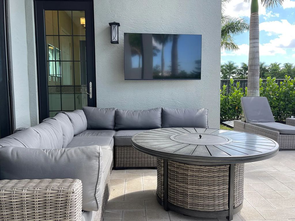 9016 Chauvet Way, Boca Raton, Florida, is built in the highly desired community of Boca Bridges and has more than 5000 square feet. This home is beautifully appointed with custom window treatments, stunning chandeliers, high-end furnishings and glamorous decor throughout.
