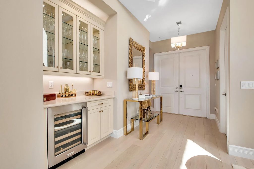 9016 Chauvet Way, Boca Raton, Florida, is built in the highly desired community of Boca Bridges and has more than 5000 square feet. This home is beautifully appointed with custom window treatments, stunning chandeliers, high-end furnishings and glamorous decor throughout.
