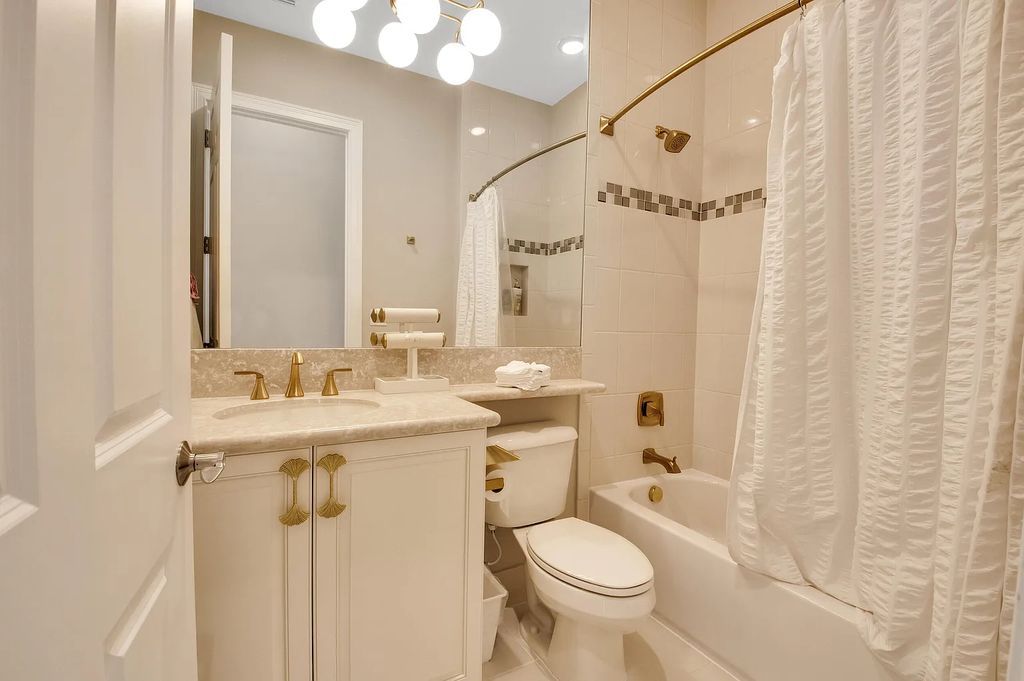 9016 Chauvet Way, Boca Raton, Florida, is built in the highly desired community of Boca Bridges and has more than 5000 square feet. This home is beautifully appointed with custom window treatments, stunning chandeliers, high-end furnishings and glamorous decor throughout.