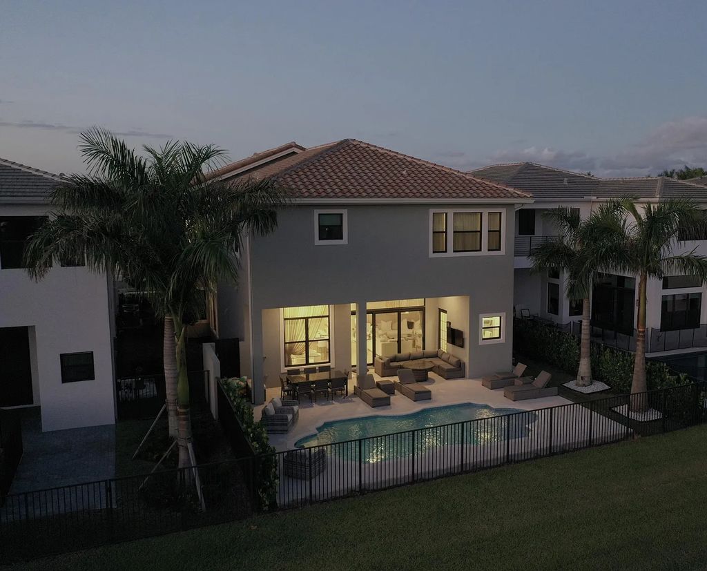 9016 Chauvet Way, Boca Raton, Florida, is built in the highly desired community of Boca Bridges and has more than 5000 square feet. This home is beautifully appointed with custom window treatments, stunning chandeliers, high-end furnishings and glamorous decor throughout.