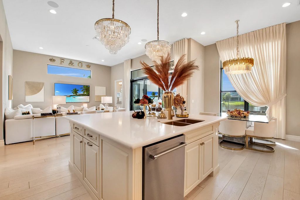 9016 Chauvet Way, Boca Raton, Florida, is built in the highly desired community of Boca Bridges and has more than 5000 square feet. This home is beautifully appointed with custom window treatments, stunning chandeliers, high-end furnishings and glamorous decor throughout.