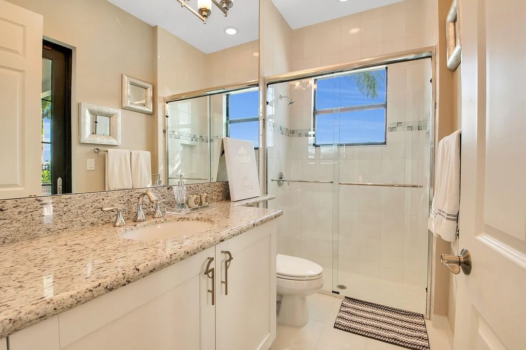 9016 Chauvet Way, Boca Raton, Florida, is built in the highly desired community of Boca Bridges and has more than 5000 square feet. This home is beautifully appointed with custom window treatments, stunning chandeliers, high-end furnishings and glamorous decor throughout.