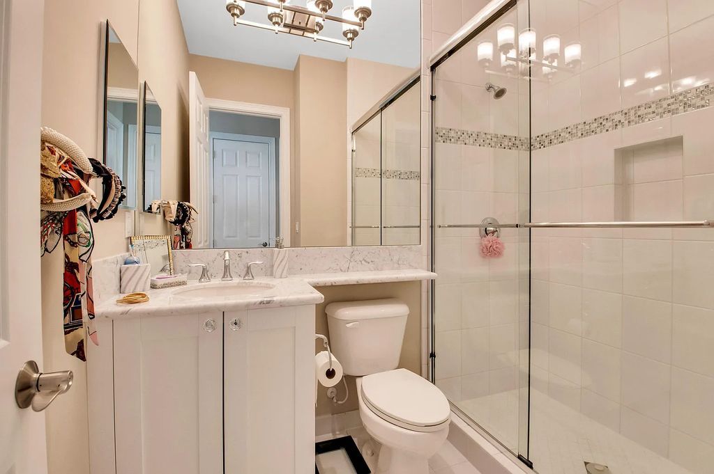 9016 Chauvet Way, Boca Raton, Florida, is built in the highly desired community of Boca Bridges and has more than 5000 square feet. This home is beautifully appointed with custom window treatments, stunning chandeliers, high-end furnishings and glamorous decor throughout.