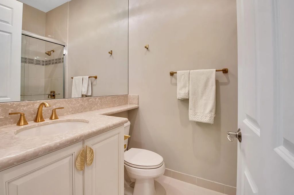 9016 Chauvet Way, Boca Raton, Florida, is built in the highly desired community of Boca Bridges and has more than 5000 square feet. This home is beautifully appointed with custom window treatments, stunning chandeliers, high-end furnishings and glamorous decor throughout.